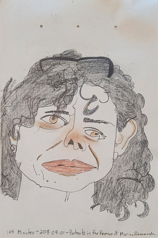 Sketch of a woman with dark, curly hair